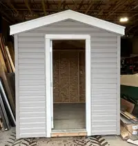 8’x10’ Wood Shed with upgraded door vs typical barn doors 