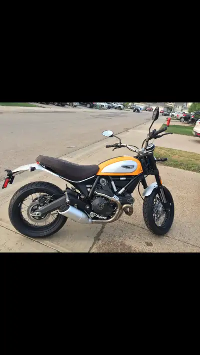 2015 Ducati Scrambler Engine Type: Air-cooled, transverse 90-degree L-twin, desmodromic SOHC, 2 valv...