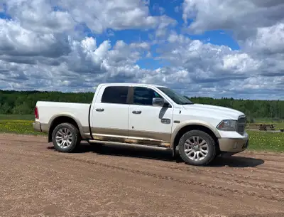 2014 ram 1500 longhorn with 370k, comes with a set of studded winter tires 40% tread left, recent fr...