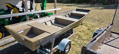 2023 Yamaha G3 1436 riveted Jon boat , with 2023 Suzuki 15hp motor and trailer . All have never been...