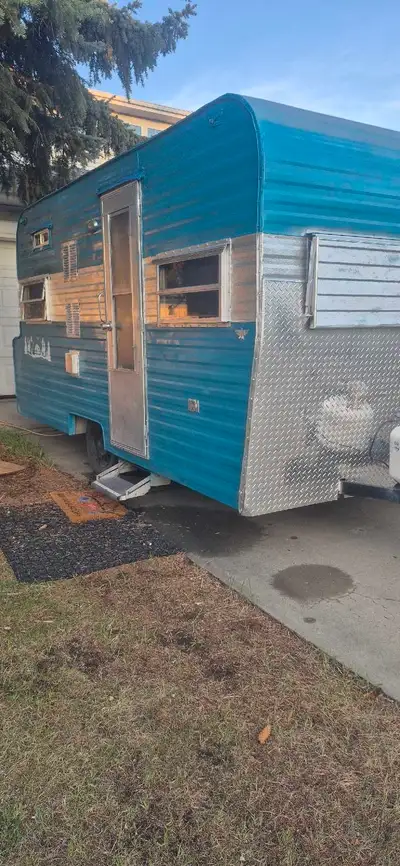1970, 14 foot, renovated travel trailer. New plumbing, kitchen sink, cabinets, electrical by journey...
