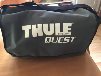 Thule Quest roof top carrier. Measures roughly 40 in. by 32 in. by 18 in. (height). Never used.