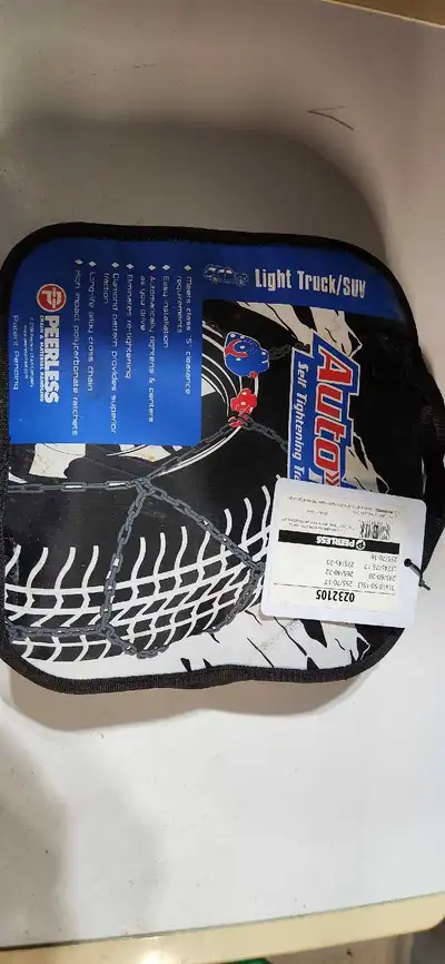 Peerless Auto-Trac self tightening tire chains for light trucks or SUVs. Installed once to check tha...