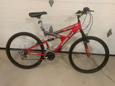 Supercycle Nitrous mountain bike, 26” wheels. 21 speed, quick release seat post, front/rear hand bra...