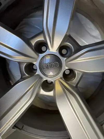 Lightly used set of four Audi Winter rims with Goodyear tires. Ultra Grip Performance SUV Gen-1 109...