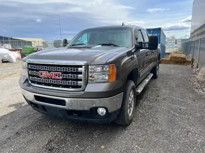 Low kms. 105,000 One owner sierra well maintained always kept inside. 8 foot box, 6 lt gas new tires...