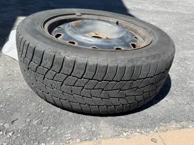 3 Used winter tires with rims.