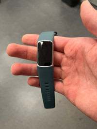 Fitbit charge 5 perfect condition. Comes with box and charger.