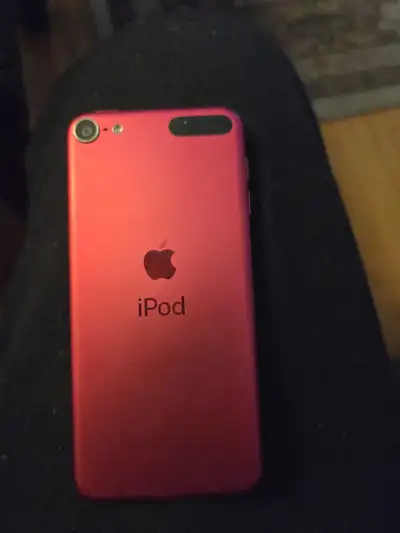 Selling a red Apple iPod 7th Gen Touch, in excellent like new condition & fully functional and ready...