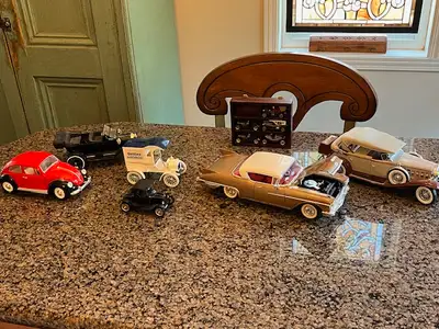 11 model cars (including 1 bank Dellixo) 11 voitures miniature, View more