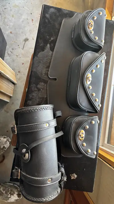 Brand new 1- Windshield pouch ( mounts on inside of windshield) 3 pockets 1- leather tube for storag...