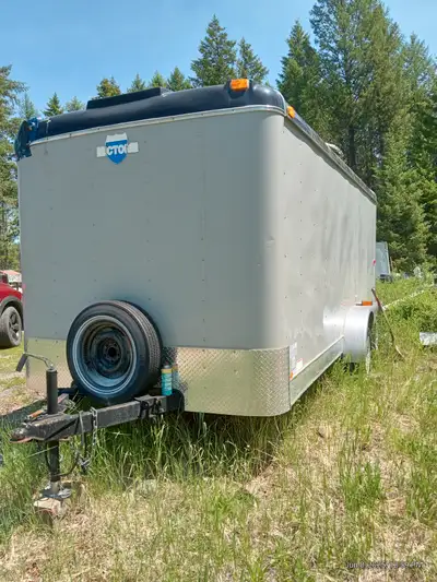 Tandem Victoria cargo trailer. 16.5 ft long. GVW 7,000 lbs. Outfitted as mobile work shop and includ...