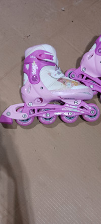 Pink Disney princess rollerblades