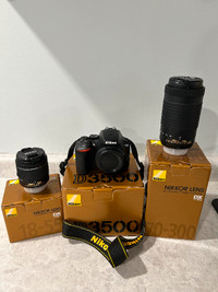 Nikon D3500 DSLR camera with 18-55 and 70-300 lenses.