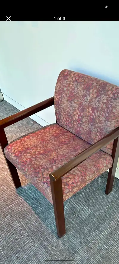 Armchair with patterned upholstery and wooden frame, View more