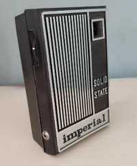 Vintage Imperial Solid State black transistor pocket radio - Tai