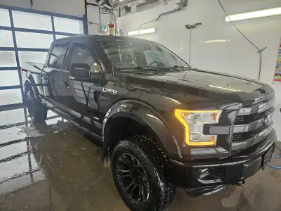 Black F-150 turbocharged 3.5L engine with a 4" lift. Immaculate condition, no rust , no issues what...