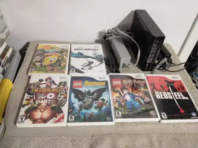 Nintendo Wii for sale $130 come with all Hook up, controller and 6 games