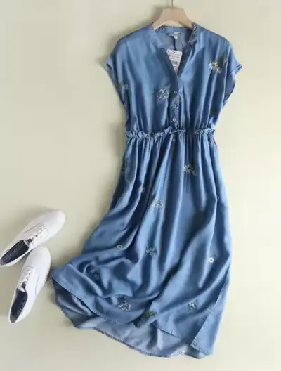 This is a stunning flower embroidered soft cotton denim summer dress. Size medium. Recommend for sma...