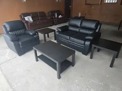 Brand new black leather love seat, chair & tables. Free delivery, View more