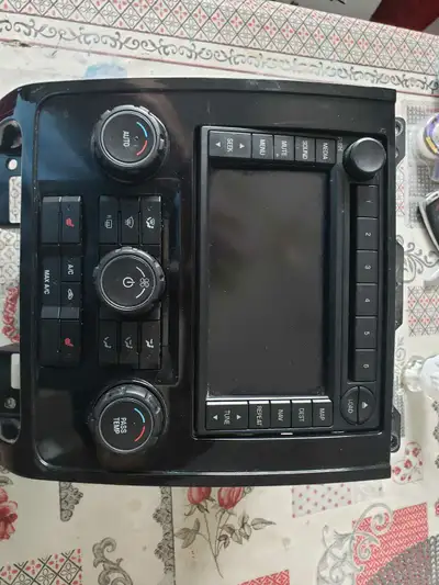 I m selling this LCD screen and screen frame --With Radio CD player and Navigation for Ford Escape 2...