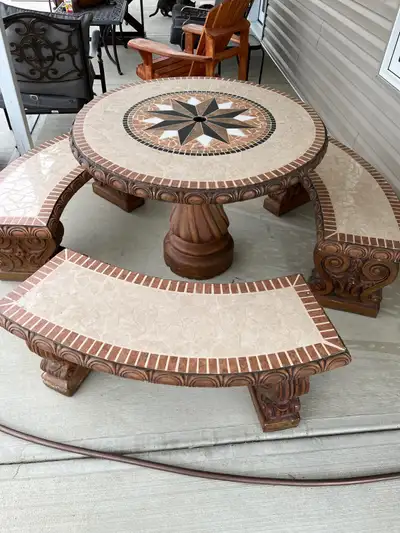 ONE OF A KIND PATIO TABLE. Beautifully tiled top and seats. 42" top and seats 6 people. This table h...