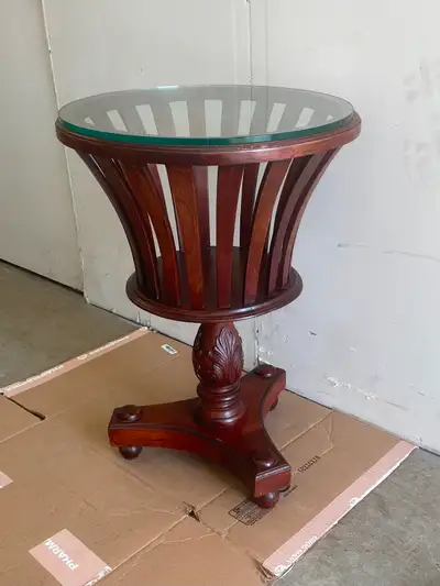 A unique vintage solid wood pedestal side table, glass top, like, View more