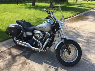 Pristine condition, like new, low KMs, Stage 1. Newer tires and battery, upgraded windshield, risers...
