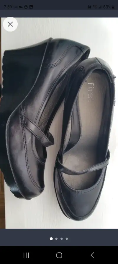 Black leather wedge New Size 8, will fit 8-9 Paid over $85 Asking $20 Will deliver in Windsor area