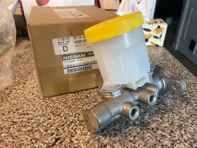 Selling a new in box OE Nissan BNR32 Skyline GTR non-ABS brake master cylinder. 3 port, 15/16” BM44...