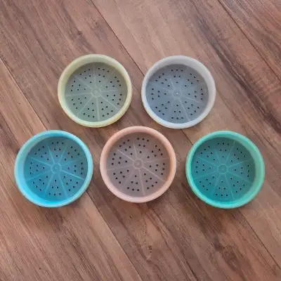 VINTAGE (1960s-70s) TUPPERWARE 'Wagon Wheel' pastel coasters, View more