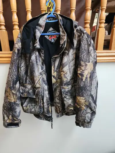 This is warm and waterproof w/4 pockets and 1 zippered inside pocket. Retired from hunting. If you s...