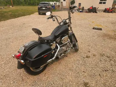 For sell a 1999 harley Davidson sportster 1200 , safety with only 11,000 kms! Turn key and go , open...