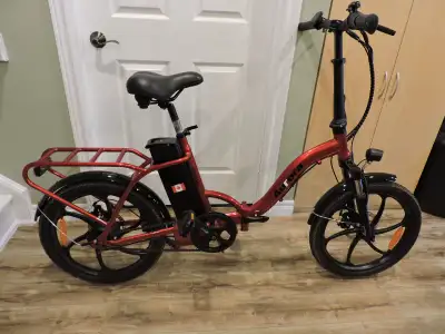 Slane Aurora E-Bike for Sale. Bought last year for $2000. Hardly used. In new condition. Folds so it...