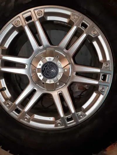 Like new rims and tires only about 2000 kms them stored inside six bolt gmc or chevy trucks 139×6 27...