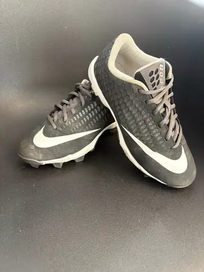 These are used Nike cleats, perfect for the baseball or softball enthusiast. They show signs of wear...