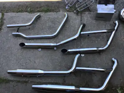 HARLEY EXHAUST SYSTEMS, EVO COMPLETE EXHAUST SYSTEMS SOFTAIL/FXR/DYNA- $150.00 WILLIE AND MAXX SADDL...