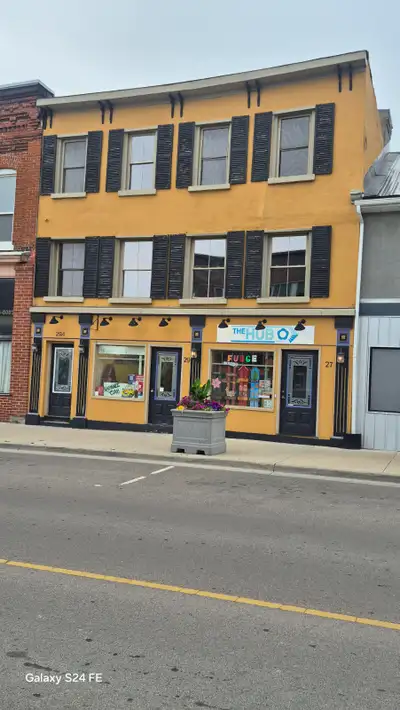 Napanee downtown two storey 3 bedroom apartment with den. full size kitchen, two bathrooms with stac...