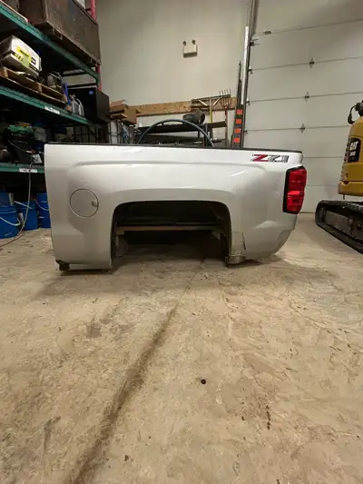 2014-2018 5.5’ Silverado box. Silver. Driver side in really good condition. Passenger side is dented...
