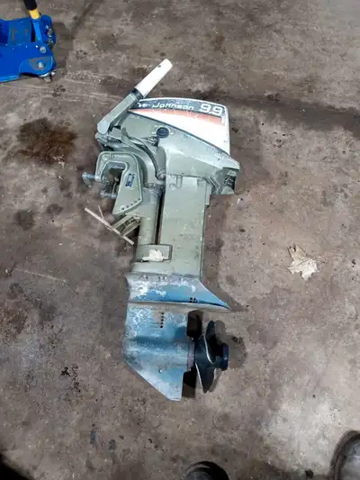 Part out this motor Lot of good parts the engine is sized from sitting to long Good prop lower unit...