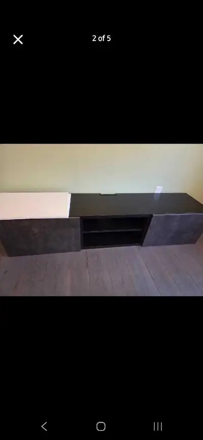 Ikea Besta Floating Ikea TV stand. Grey doors are currently attached. Extra changeable white doors i...