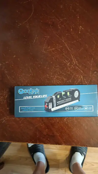 This Qooltek laser level is new in box, perfect for various leveling tasks, ensuring precision with...