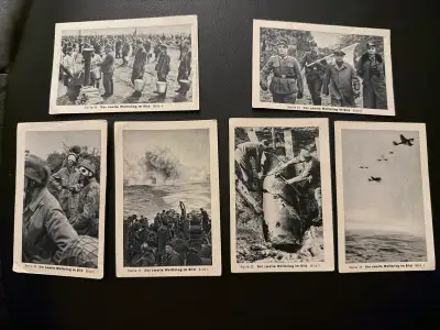 These are vintage cards depicting scenes from World War II. Images show various wartime activities a...