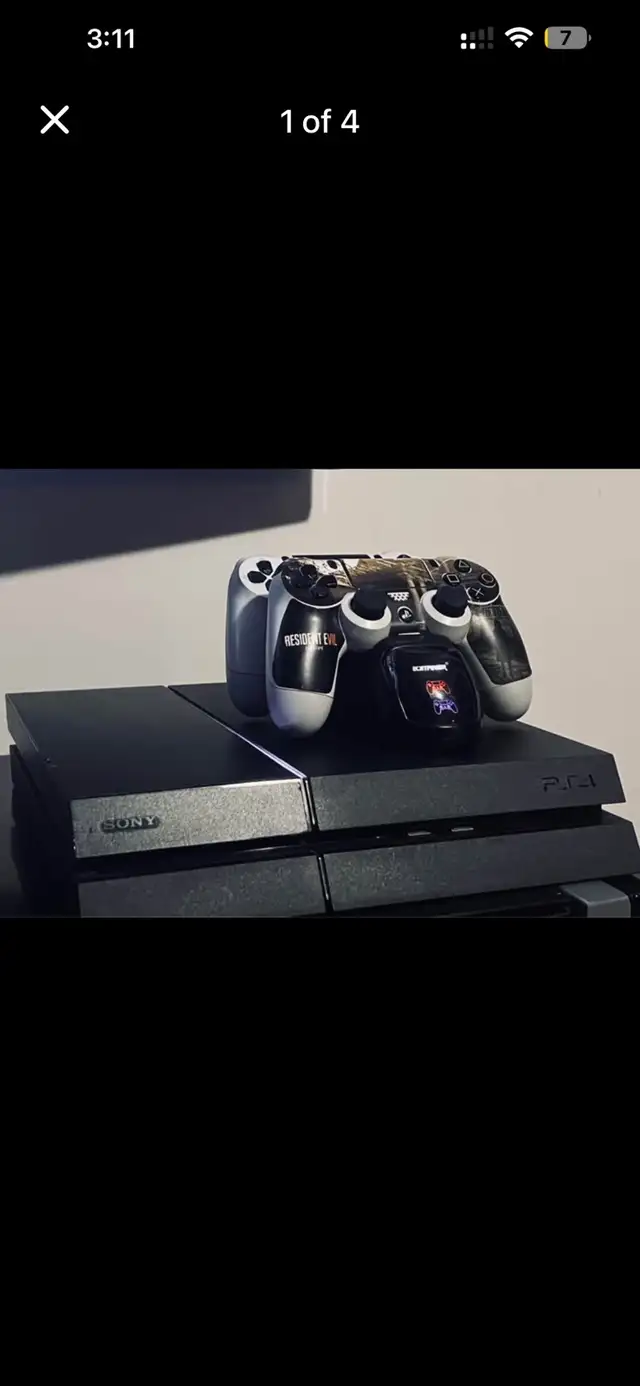PS4 + 2 Controllers + Charger + 6 Games