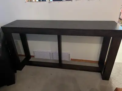 Solid, couch table. 33” tall, 16” deep, 64” long