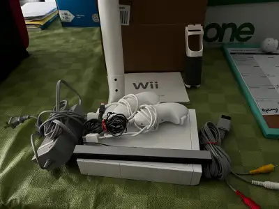 Wii Console with 2xnunchucks, View more