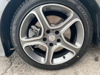 OEM rims with original Mercedes center caps and brand new low profile all season tires run flat’s. S...