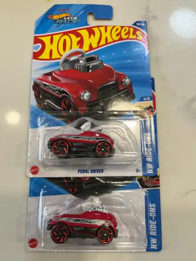 I'm offering two new Hot Wheels TH PEDAL DRIVER collectable cars, still in their original packaging...