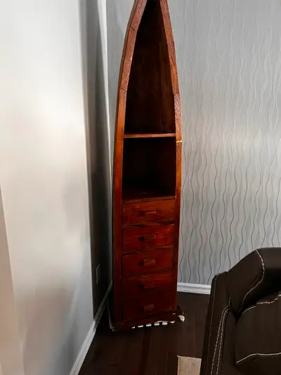 Beautiful shelves book case for sale it’s in a shape of a boat