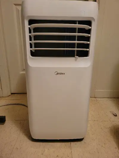 This is a Midea air conditioner that I've only used twice. It includes all the accessories, plus a D...